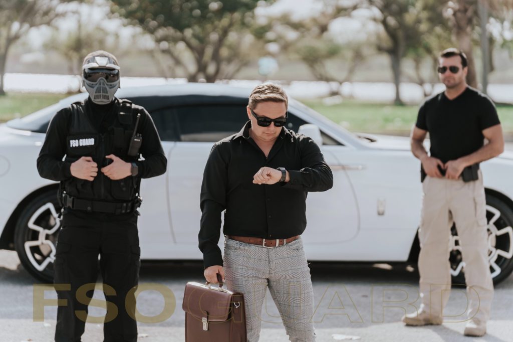 FSO Guard security officer escorting a business client in Miami